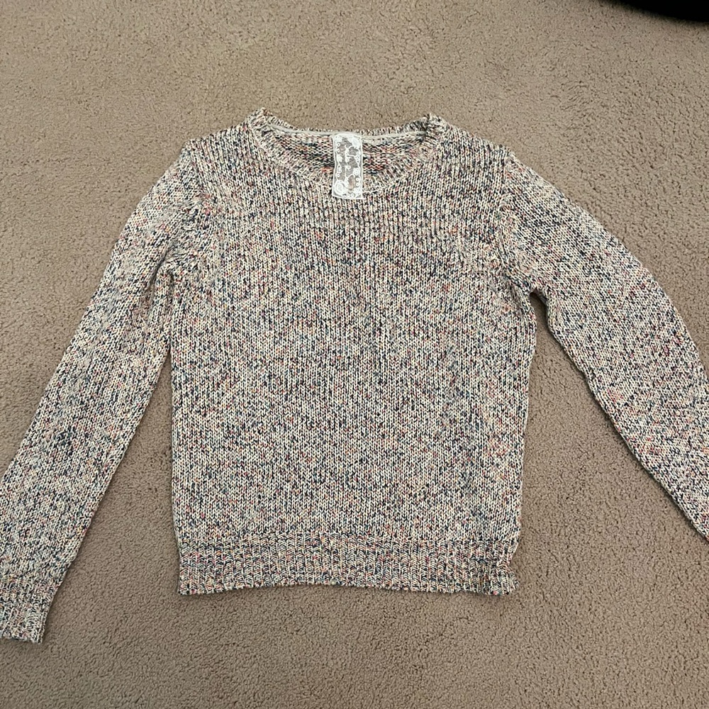 White colorful sweater